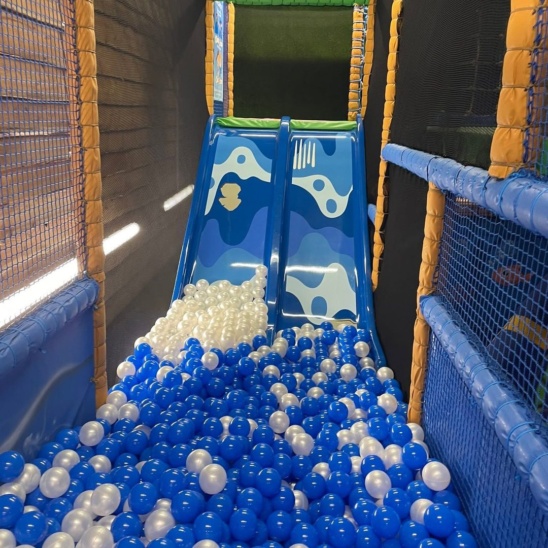 The slide pouring into the Griffin Bach ball pit